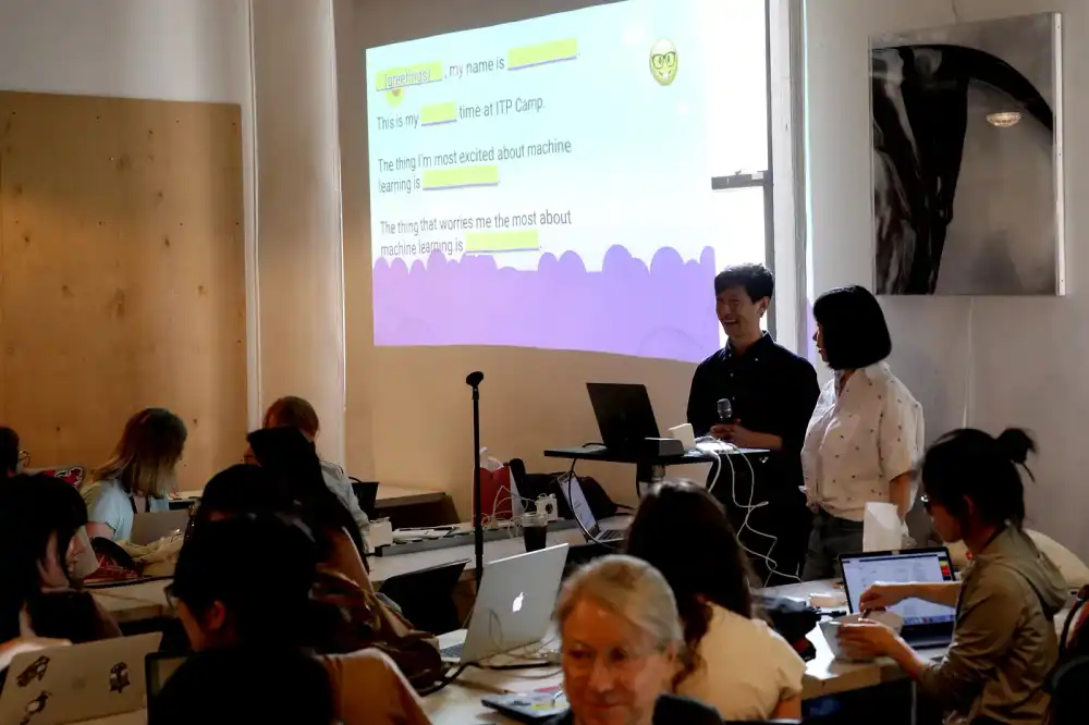 Joey Lee and Yining Shi leading a workshop about ml5.js for ITP Camp